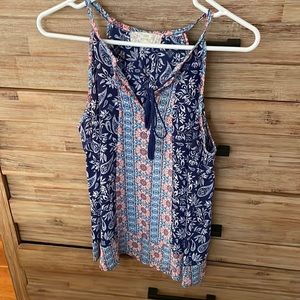 Multi colored top. In excellent condition